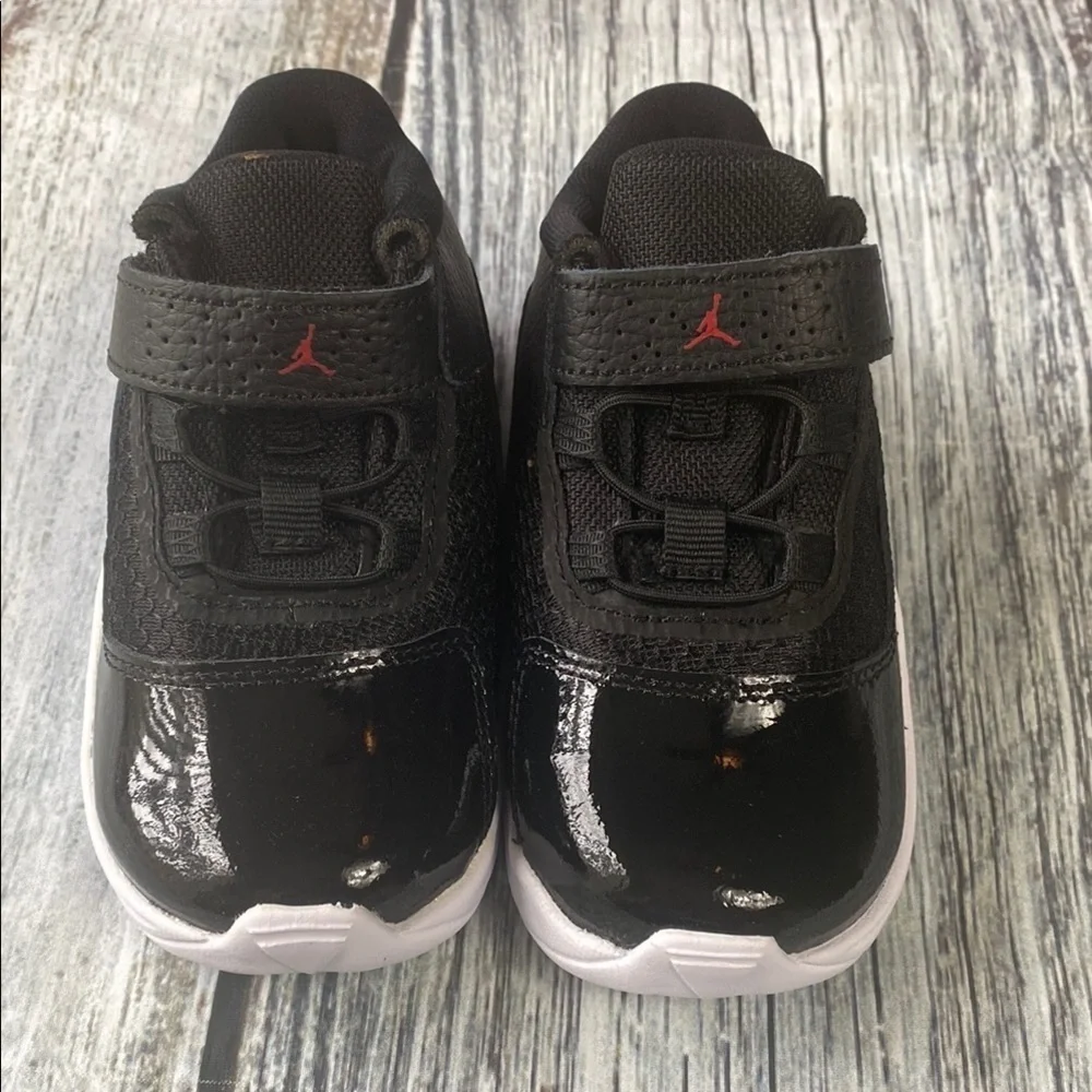 Kids Jordan 11 CMFT LOW Black Sneakers with Red Accents SIZE 8C